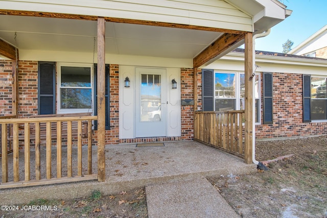 entrance to property with covered porch