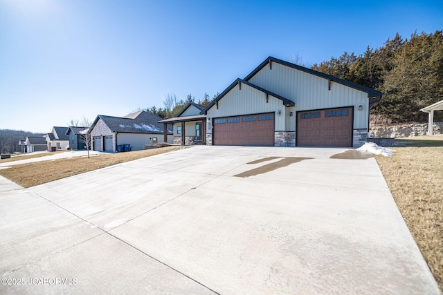 modern farmhouse style home with a garage and a front yard