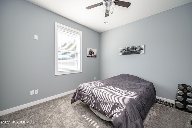 bedroom featuring ceiling fan and carpet flooring