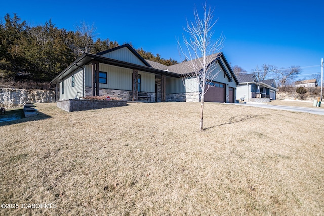 view of front of home featuring a garage and covered porch