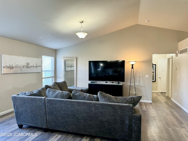 living area featuring vaulted ceiling, wood finished floors, visible vents, and baseboards