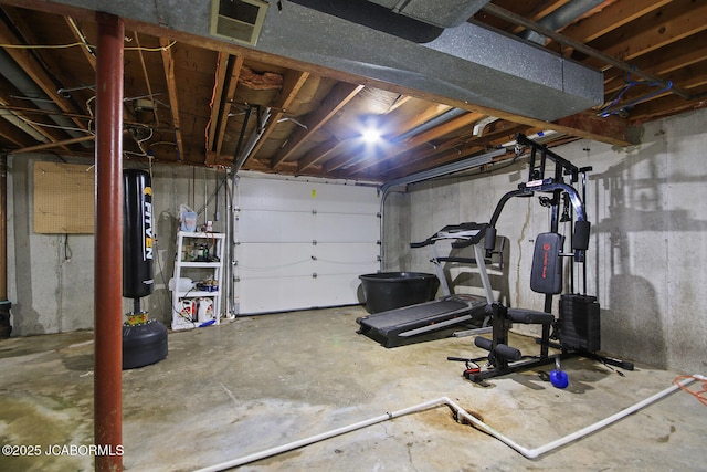 workout area with gas water heater and visible vents