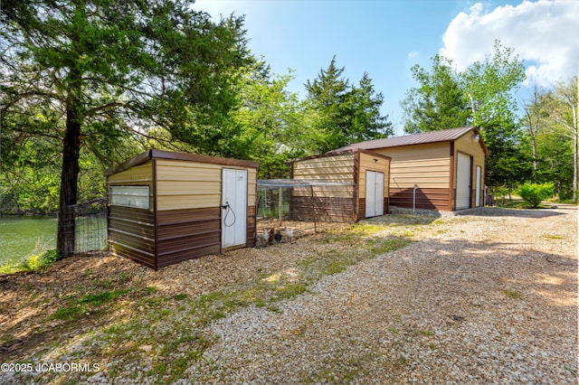 view of outbuilding featuring an outdoor structure