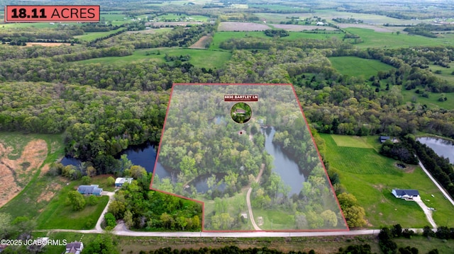 bird's eye view featuring a water view and a rural view