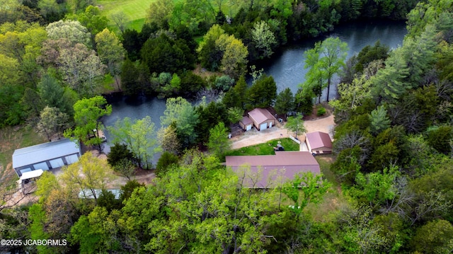 aerial view featuring a water view and a wooded view