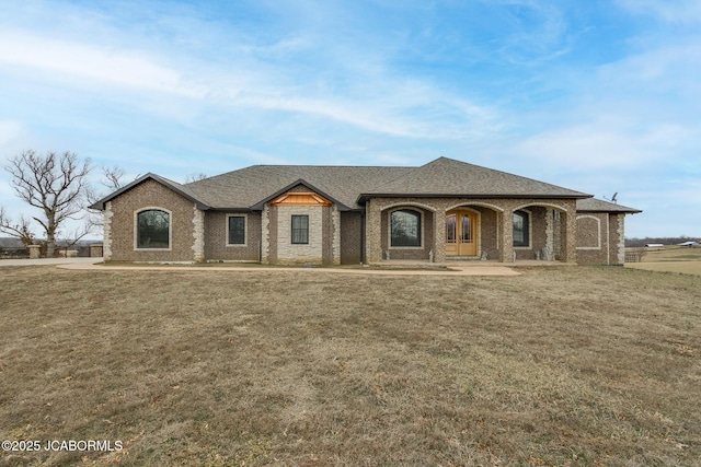 view of front of home featuring a front yard and a porch