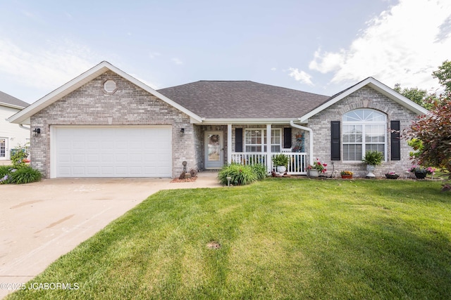 219 Northrup Ave, Holts Summit, MO 65043 - single story home featuring a porch, brick siding, a front yard, concrete driveway, and an attached garage