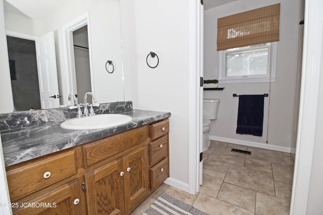 164 Turn Back Now Trl, Linn, MO 65051 - bathroom with vanity, toilet, baseboards, and tile patterned flooring