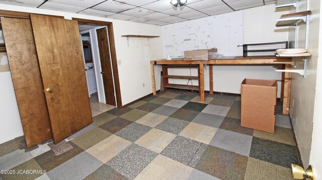 164 Turn Back Now Trl, Linn, MO 65051 - below grade area with a workshop area and a drop ceiling