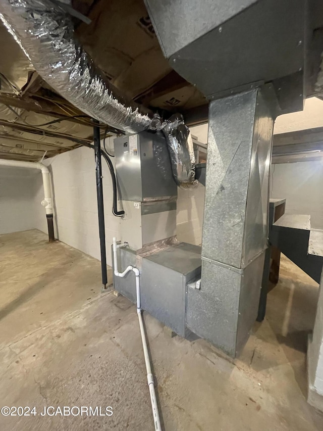 basement featuring heating unit