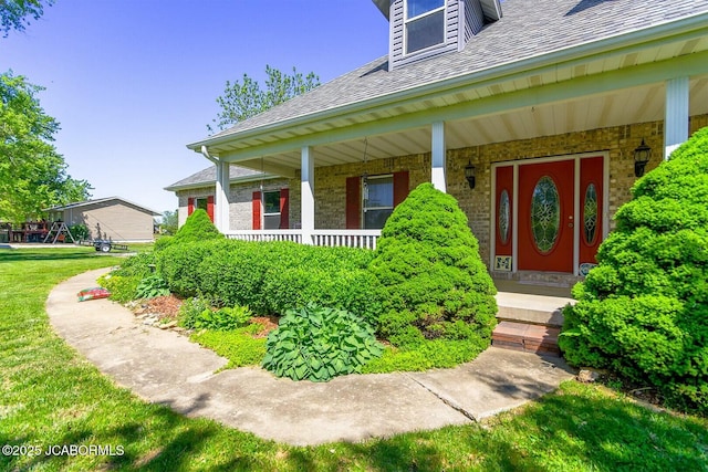 doorway to property with a porch