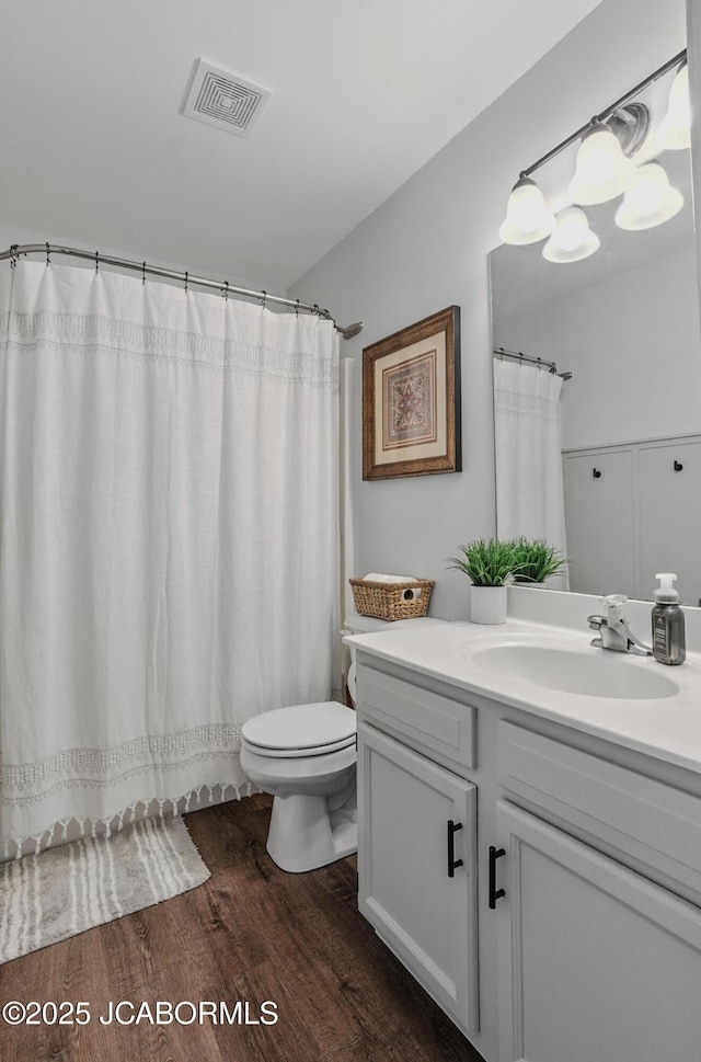 5112 Melissa Dr, Columbia, MO 65202 - bathroom featuring wood finished floors and vanity