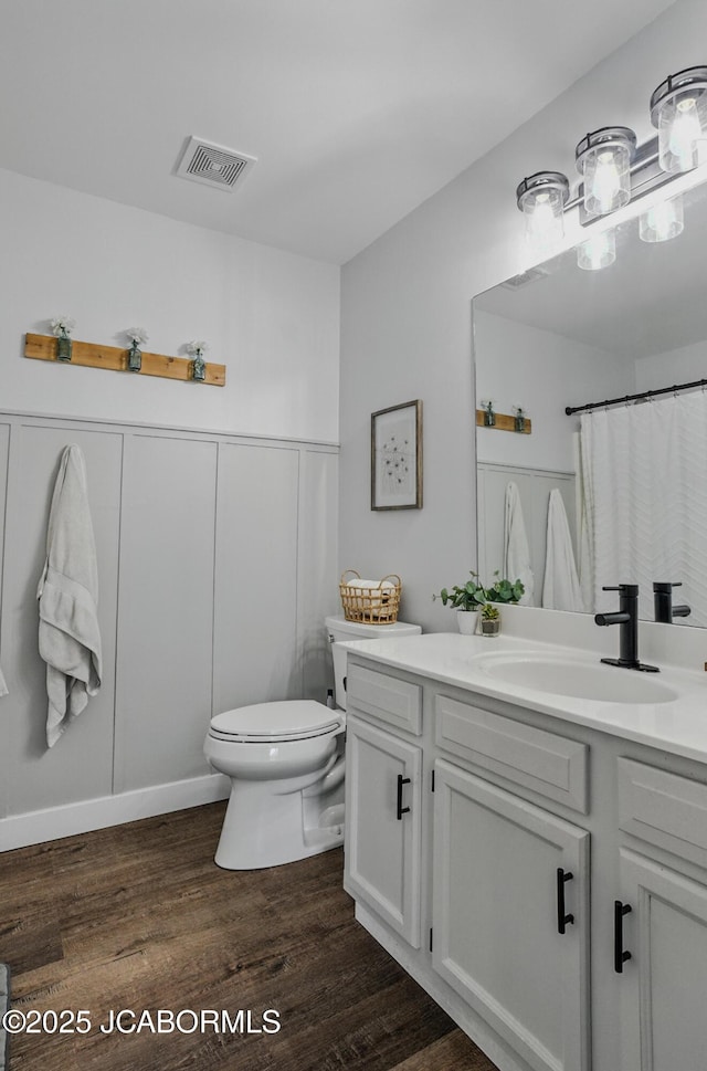 5112 Melissa Dr, Columbia, MO 65202 - bathroom with vanity, wood finished floors, and a shower with shower curtain