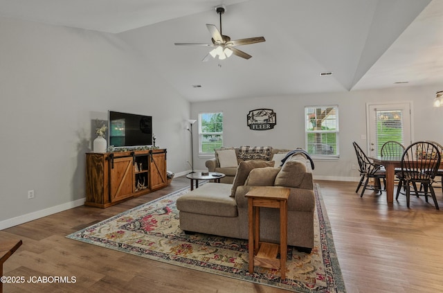 5112 Melissa Dr, Columbia, MO 65202 - living room featuring a ceiling fan, wood finished floors, and high vaulted ceiling