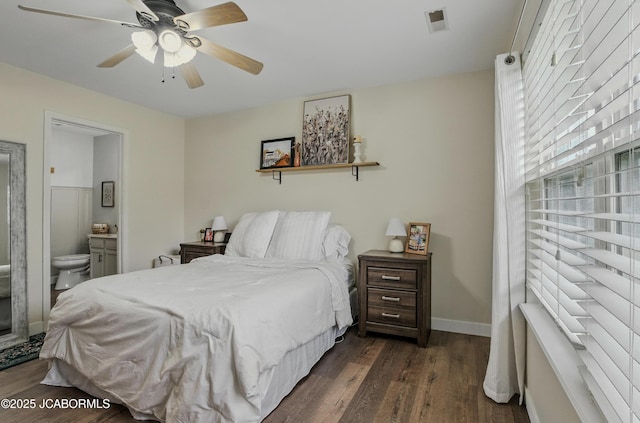 5112 Melissa Dr, Columbia, MO 65202 - bedroom with dark wood-type flooring, ensuite bathroom, and ceiling fan