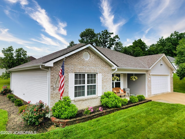 5112 Melissa Dr, Columbia, MO 65202 - single story home with brick siding, covered porch, a front lawn, a garage, and driveway