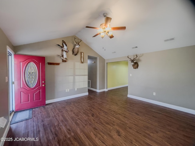 entrance foyer with visible vents, lofted ceiling, a ceiling fan, wood finished floors, and baseboards