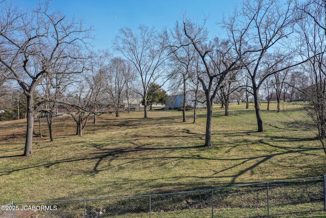 view of yard with fence