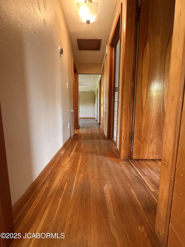 713 Lincoln St, Linn, MO 65051 - corridor featuring wood finished floors