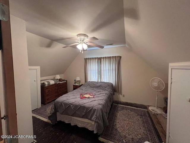 bedroom with ceiling fan and lofted ceiling