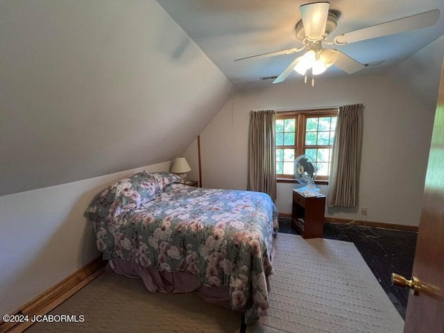 bedroom featuring ceiling fan and lofted ceiling