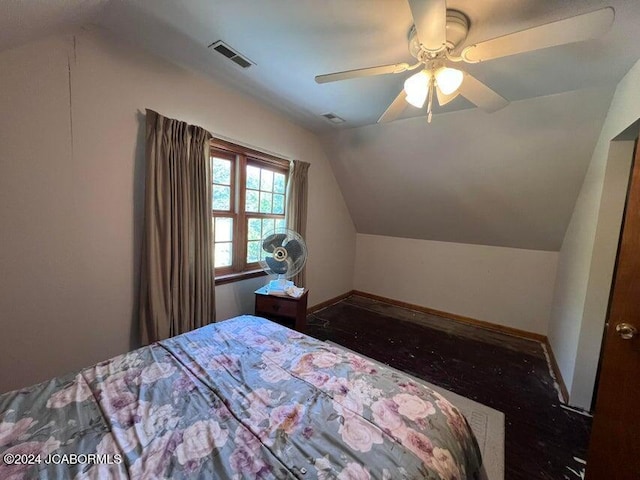 bedroom featuring ceiling fan and vaulted ceiling