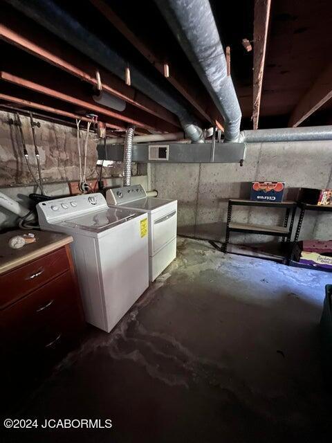 interior space with washing machine and dryer