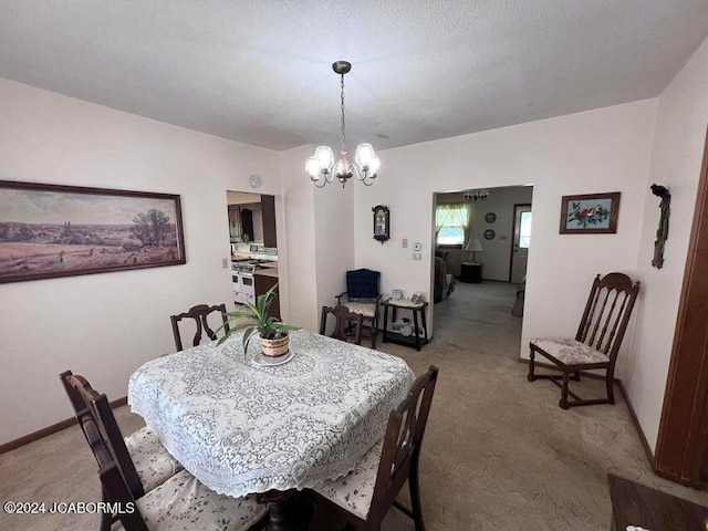 carpeted dining space featuring a textured ceiling and a notable chandelier