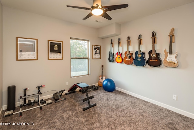 workout area featuring carpet, visible vents, ceiling fan, and baseboards