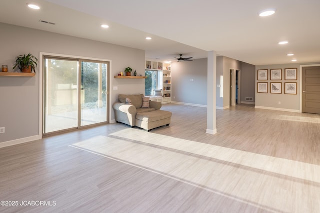 unfurnished room with visible vents, baseboards, a ceiling fan, light wood-type flooring, and recessed lighting