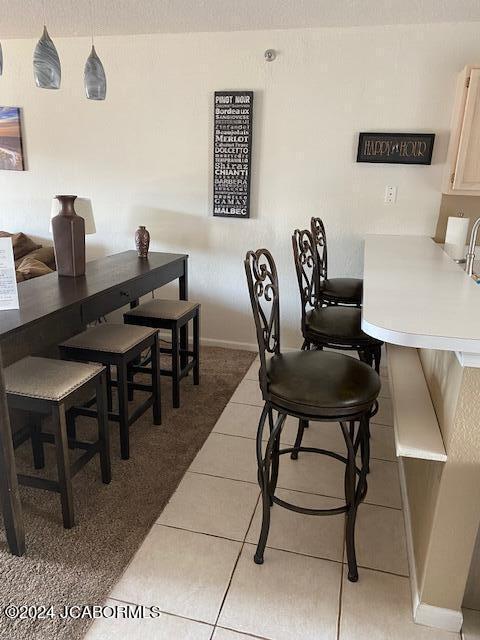 view of tiled dining area