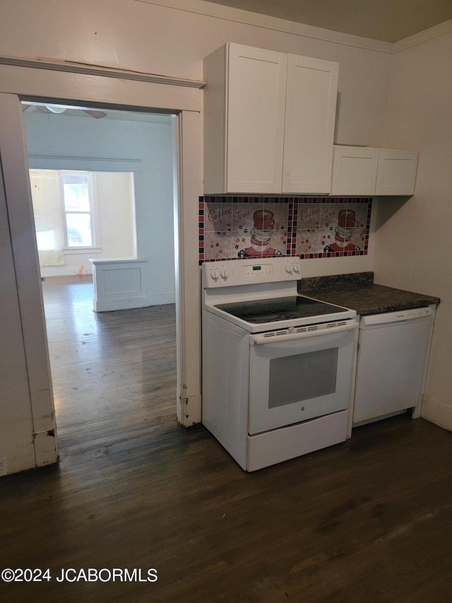 kitchen with white cabinets, decorative backsplash, white appliances, and dark wood-type flooring