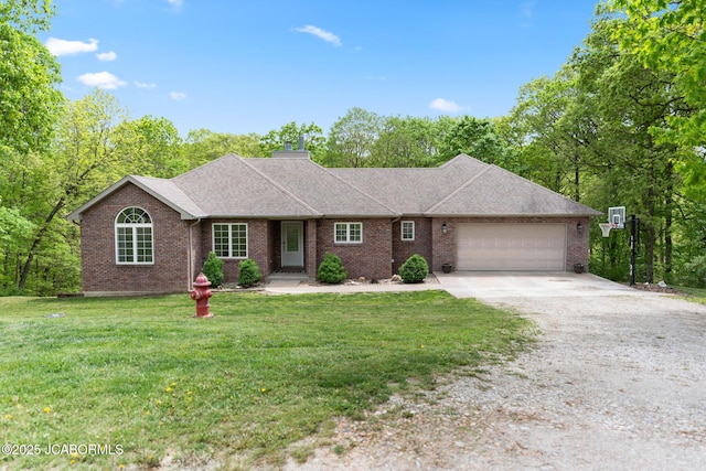 single story home with a front yard, gravel driveway, brick siding, a shingled roof, and an attached garage