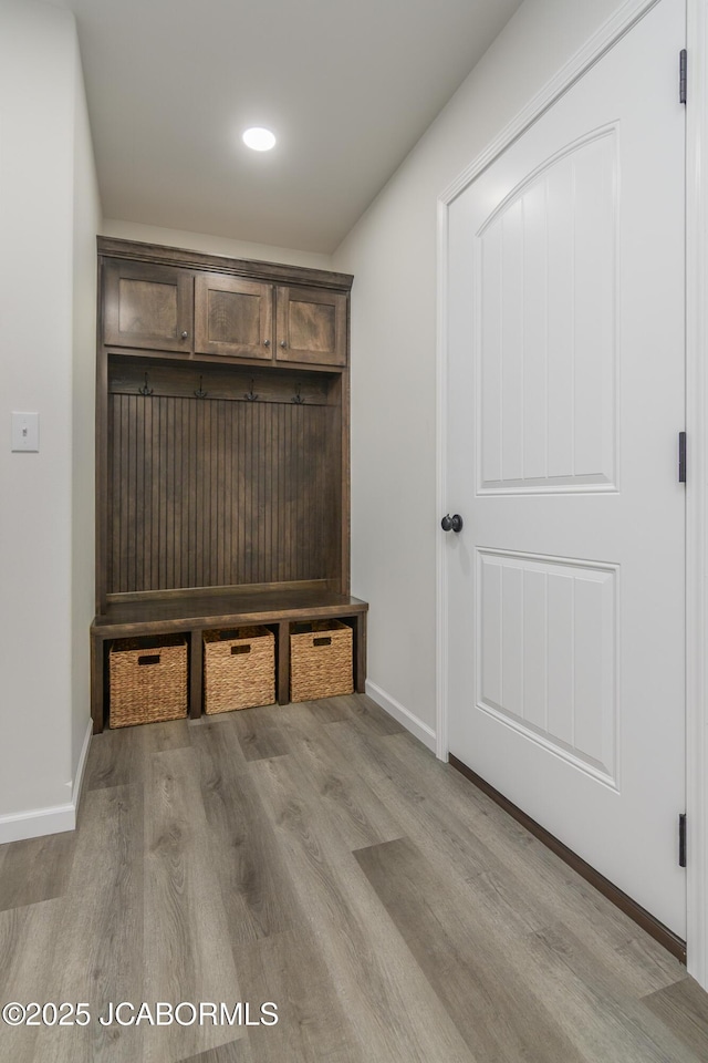1502 Summerfield Dr, Jefferson City, MO 65109 - mudroom with wood finished floors, baseboards, and recessed lighting