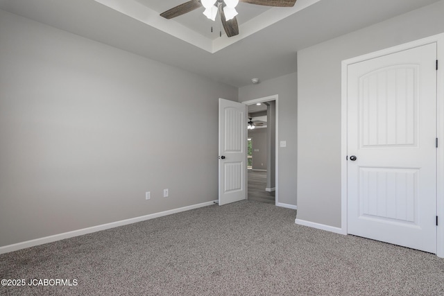1502 Summerfield Dr, Jefferson City, MO 65109 - unfurnished bedroom with carpet floors, baseboards, and a ceiling fan