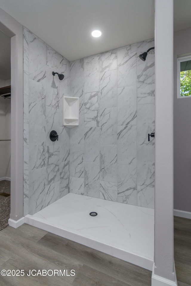 1502 Summerfield Dr, Jefferson City, MO 65109 - bathroom with tiled shower, wood finished floors, baseboards, and recessed lighting