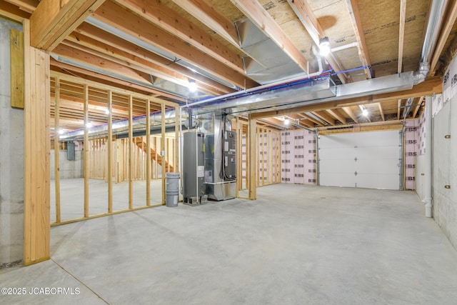 1502 Summerfield Dr, Jefferson City, MO 65109 - unfinished below grade area featuring heating unit and electric water heater