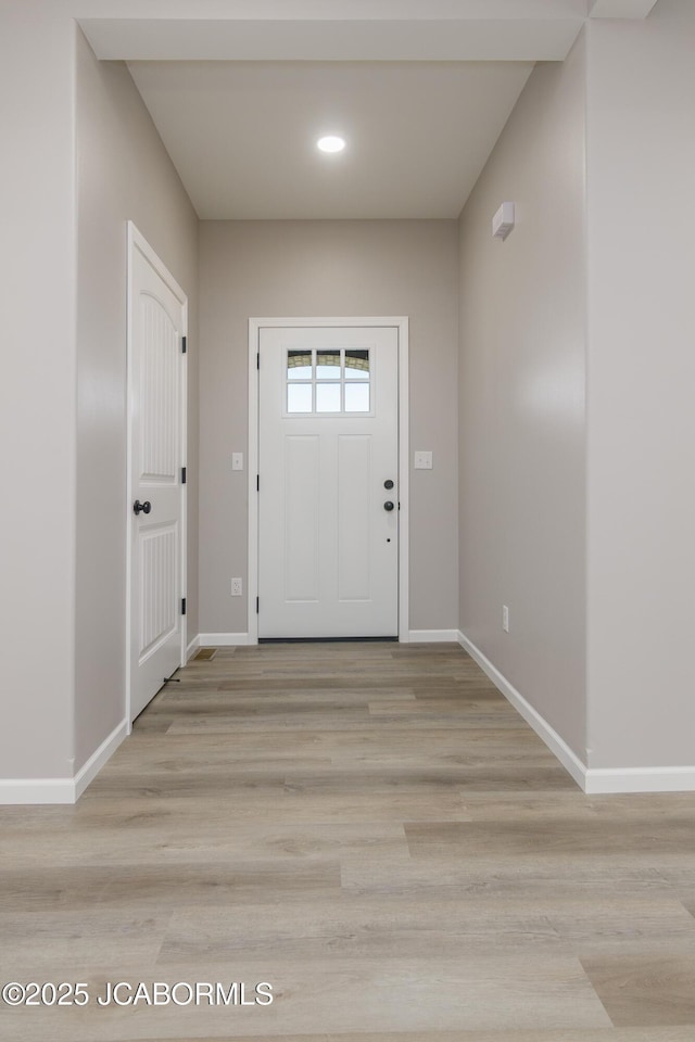 1502 Summerfield Dr, Jefferson City, MO 65109 - entrance foyer with baseboards, light wood-style flooring, and recessed lighting
