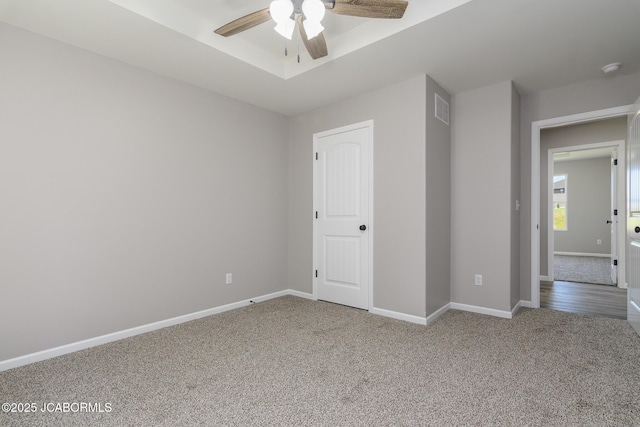 1502 Summerfield Dr, Jefferson City, MO 65109 - unfurnished bedroom with carpet flooring, baseboards, and a ceiling fan