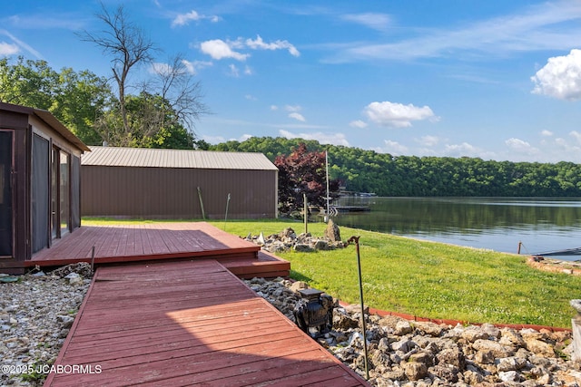 24671 Gardner Rd, Versailles, MO 65084 - wooden terrace featuring a water view, a yard, and a wooded view