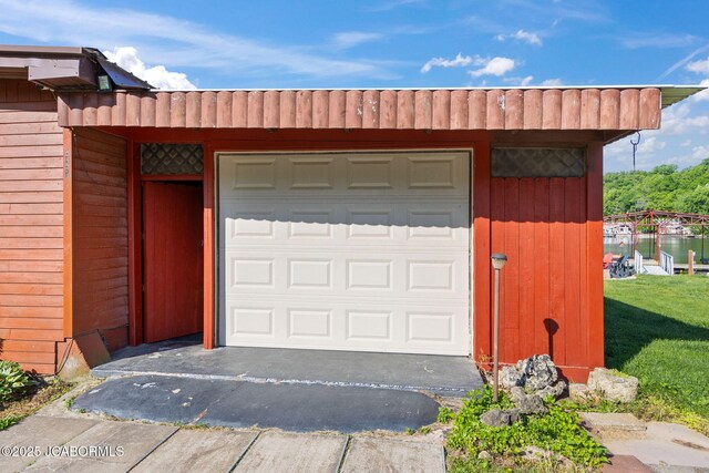 24671 Gardner Rd, Versailles, MO 65084 - garage with asphalt driveway