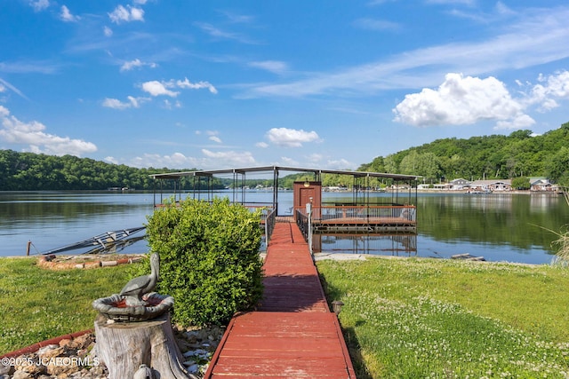 24671 Gardner Rd, Versailles, MO 65084 - dock featuring a water view, a wooded view, and boat lift