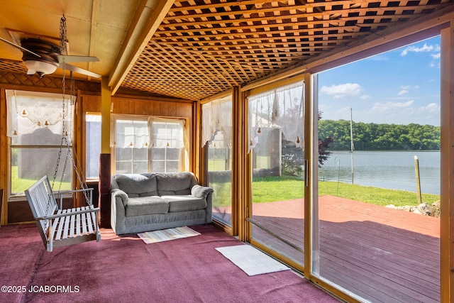 24671 Gardner Rd, Versailles, MO 65084 - sunroom / solarium with a ceiling fan, a deck with water view, and carpet flooring