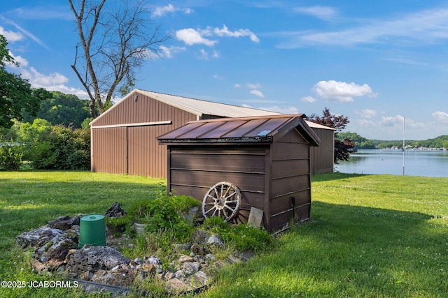 24671 Gardner Rd, Versailles, MO 65084 - view of outbuilding with an outdoor structure and a water view
