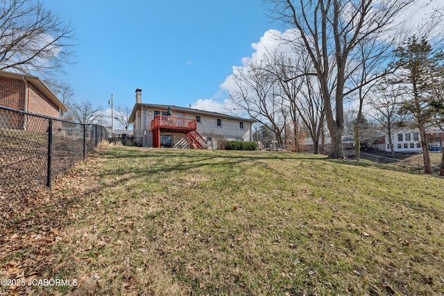 view of yard featuring stairway, a wooden deck, and a fenced backyard