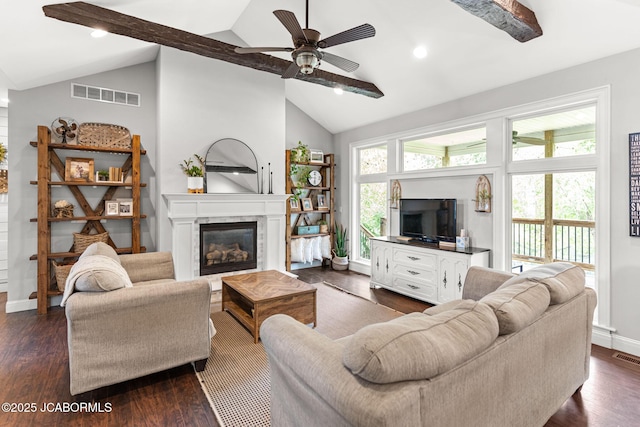 109 Redtail Dr, Ashland, MO 65010 - living area with a ceiling fan, a glass covered fireplace, and dark wood-type flooring