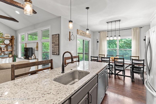 109 Redtail Dr, Ashland, MO 65010 - kitchen with appliances with stainless steel finishes, gray cabinets, dark wood finished floors, light stone countertops, and pendant lighting