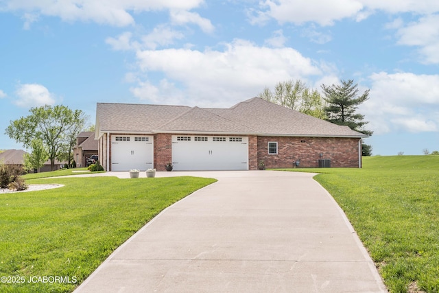 ranch-style home with a garage, brick siding, a front lawn, and concrete driveway