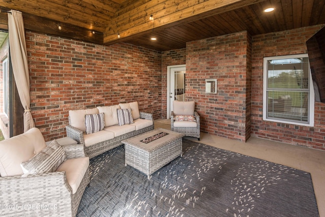 view of patio / terrace featuring an outdoor living space with a fire pit