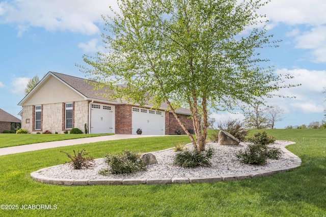 view of front of home featuring an attached garage, stone siding, a front lawn, and driveway